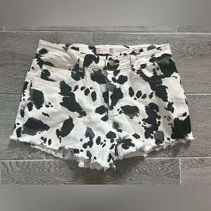 Cow print jean shorts